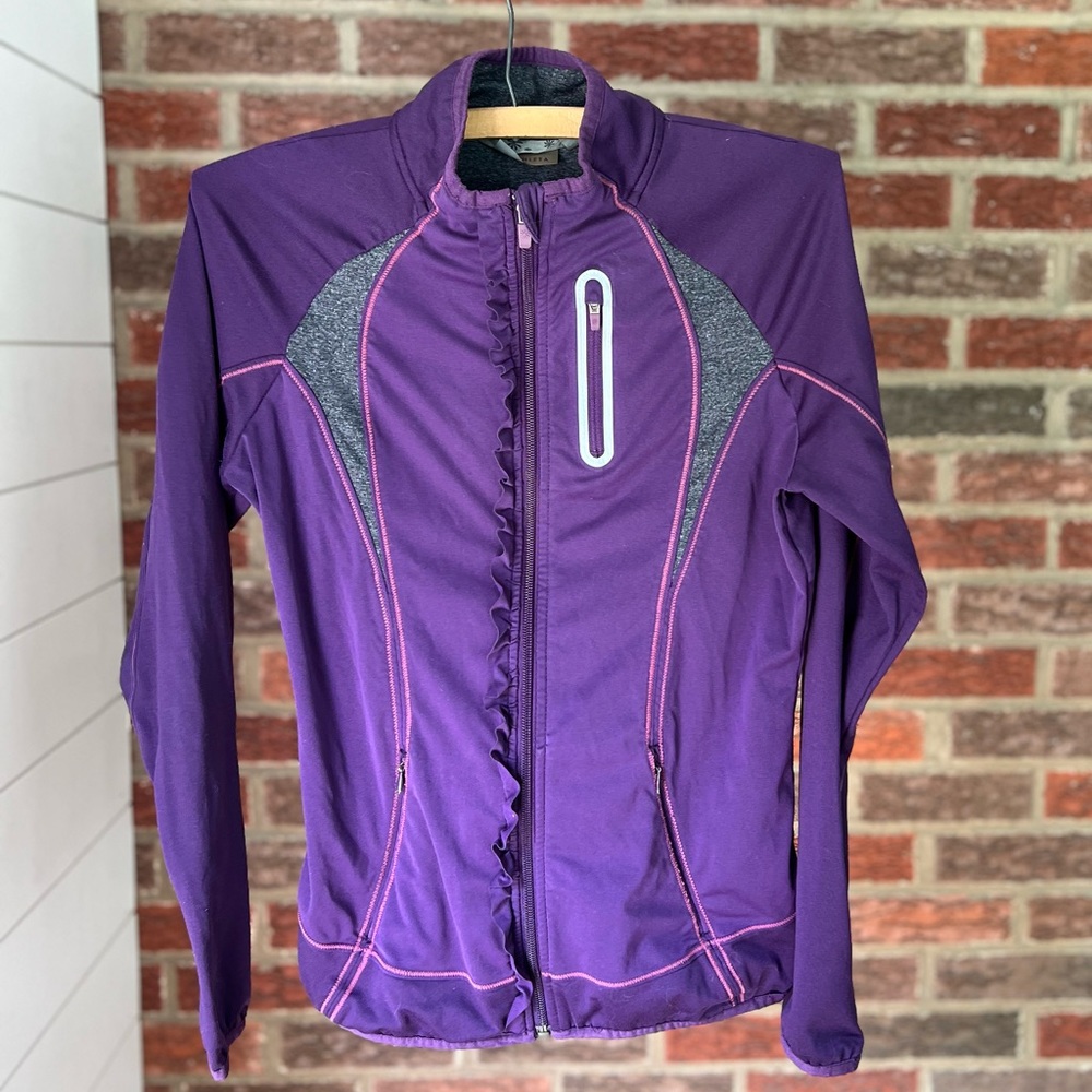 ATHLETA Prevail Zip Up Ruffle Front Running Jacket